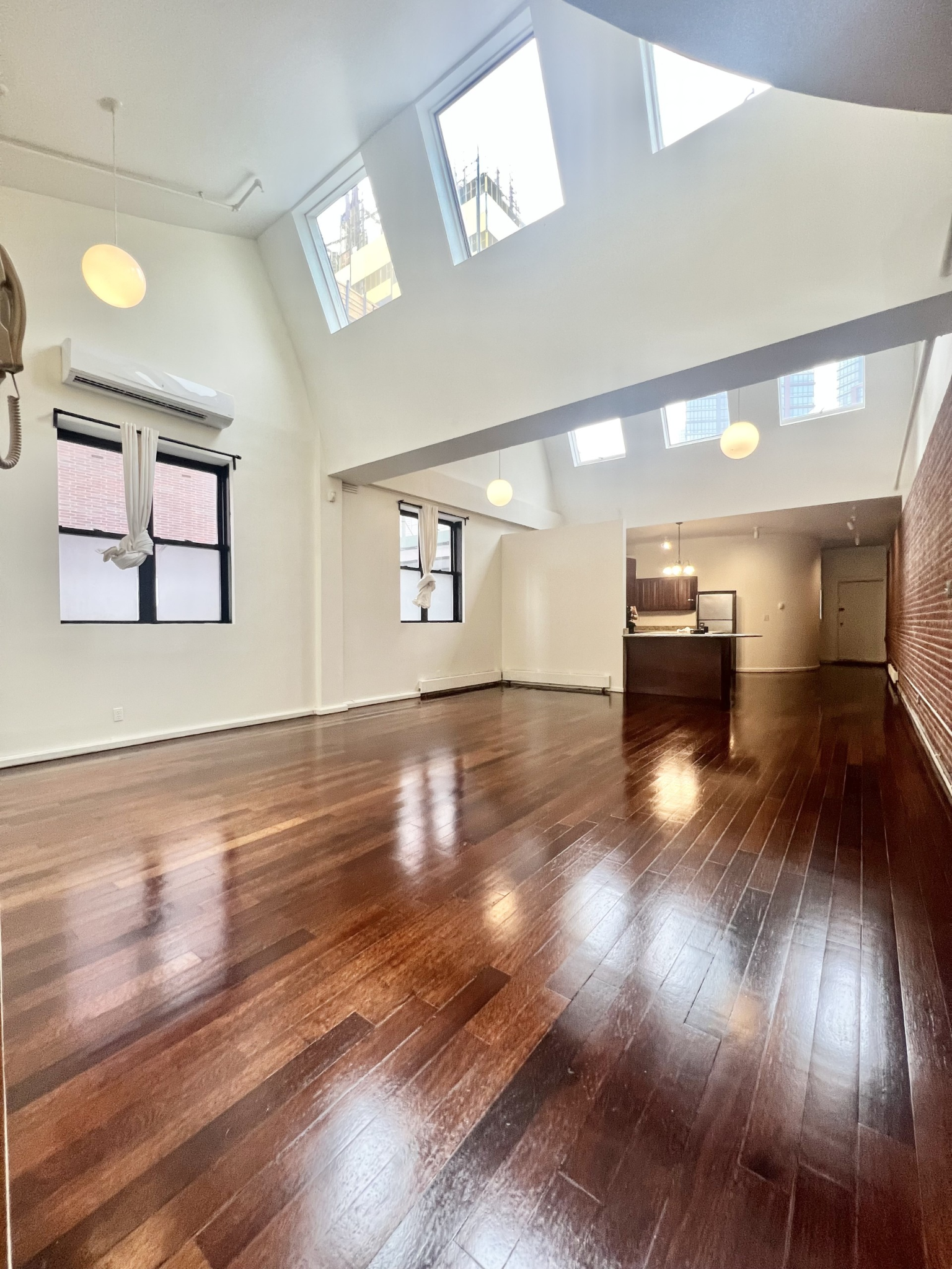 Double-height interior loft space at the Greenpoint property