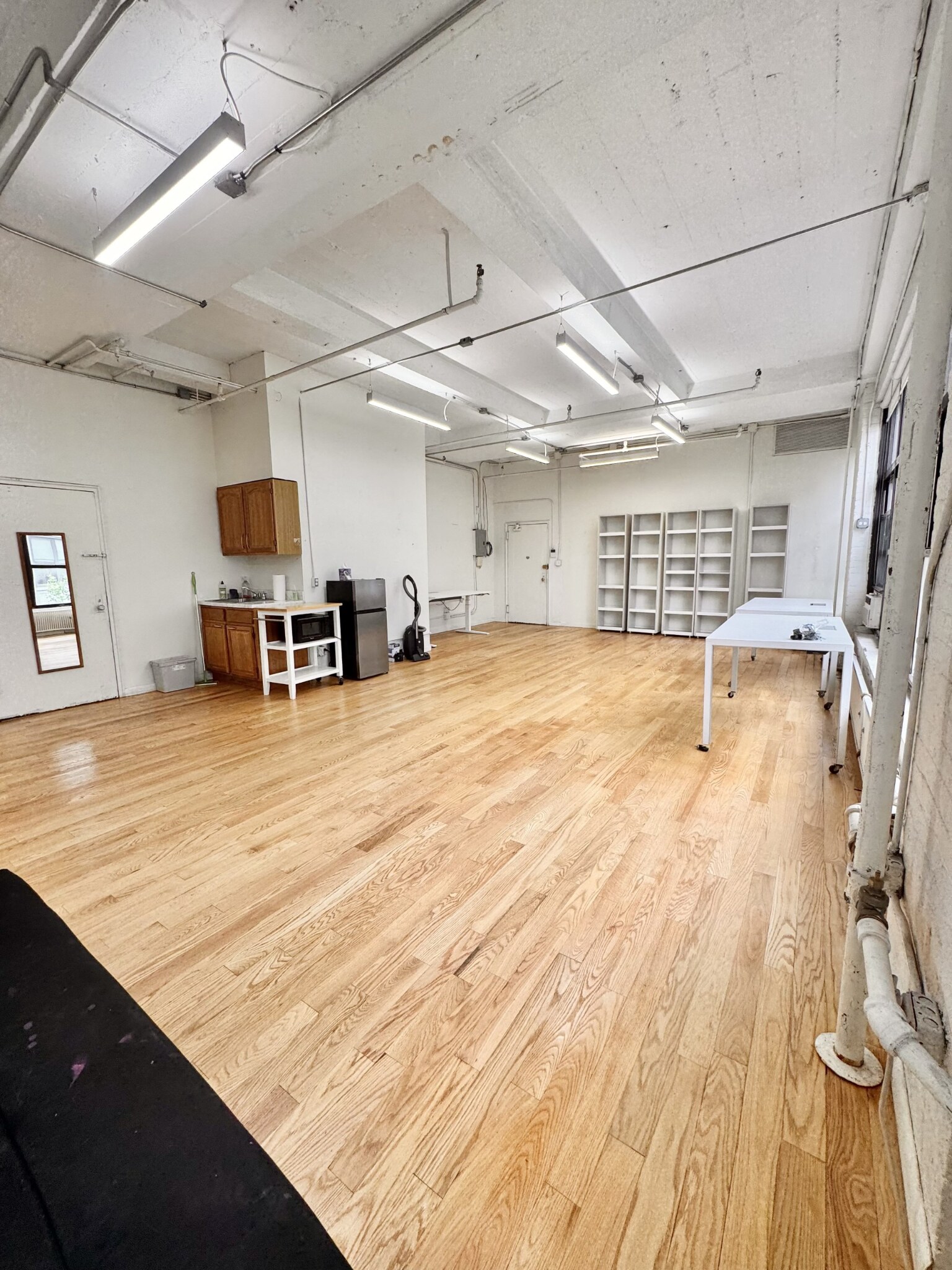Sun-filled Long Island City artist loft interior photo 1