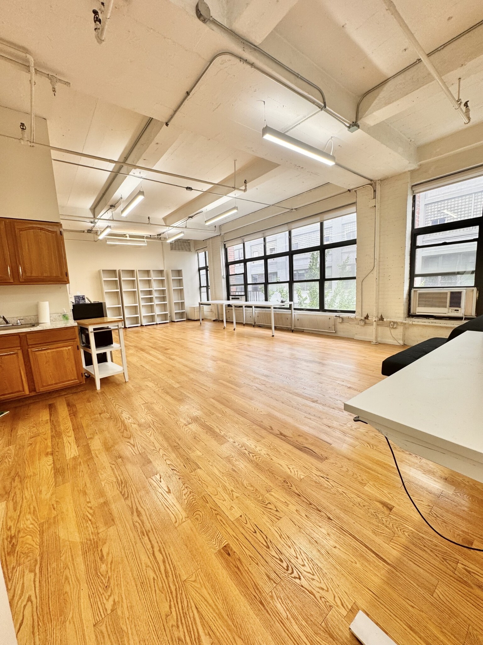 Sun-filled Long Island City artist loft interior photo 2